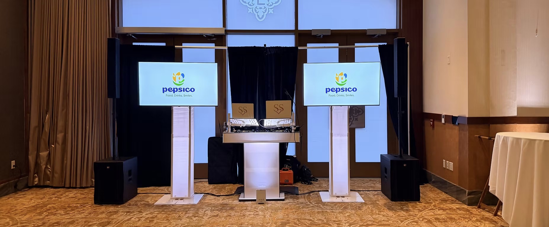 DJ Steven Share branded dual-screen setup at a PepsiCo corporate event